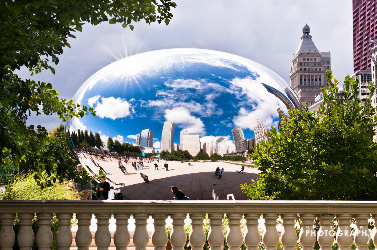 The dark clouds roll in behind Cloud Gate