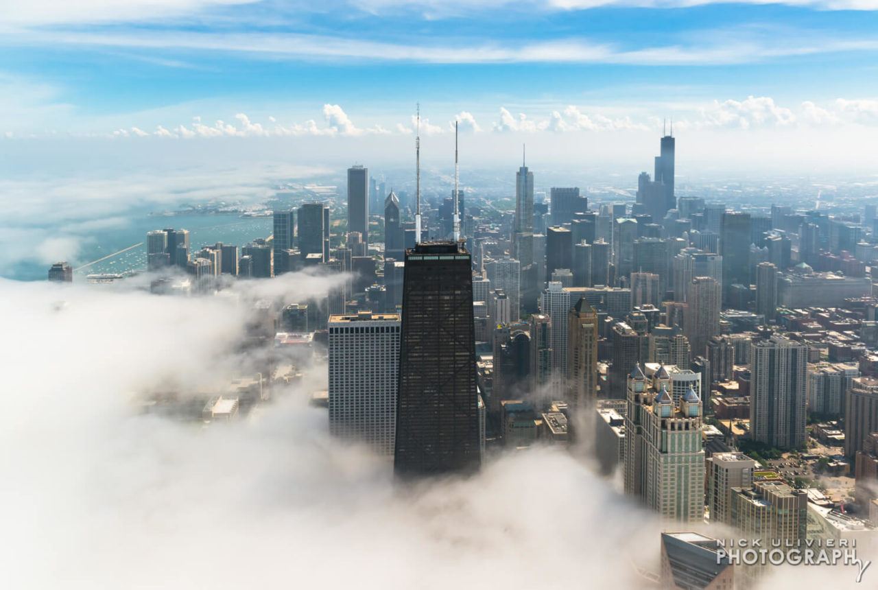 Fog invades Chicagos skyline aerial