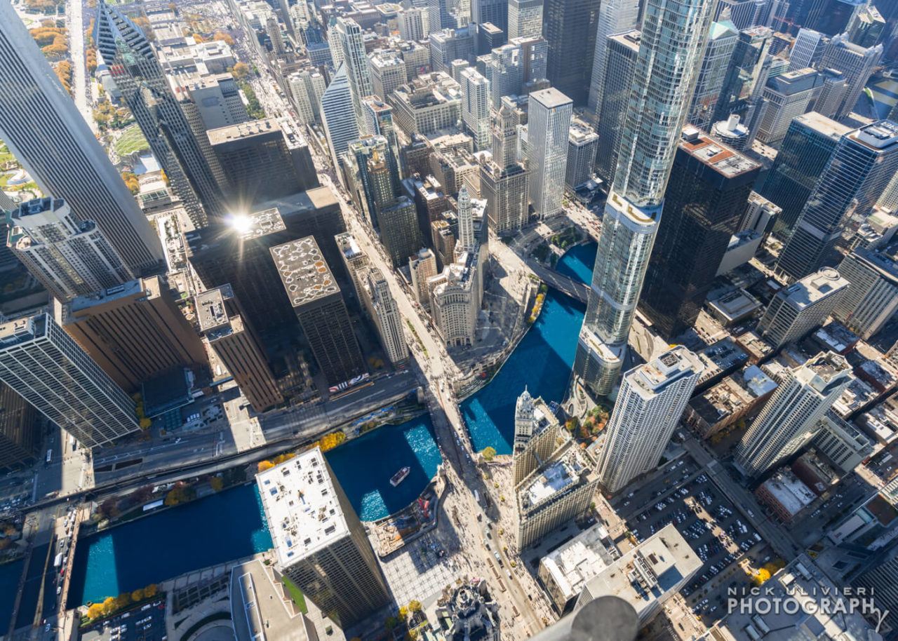 The Chicago River dyed blue for the Chicago Cubs World Series parade aerial