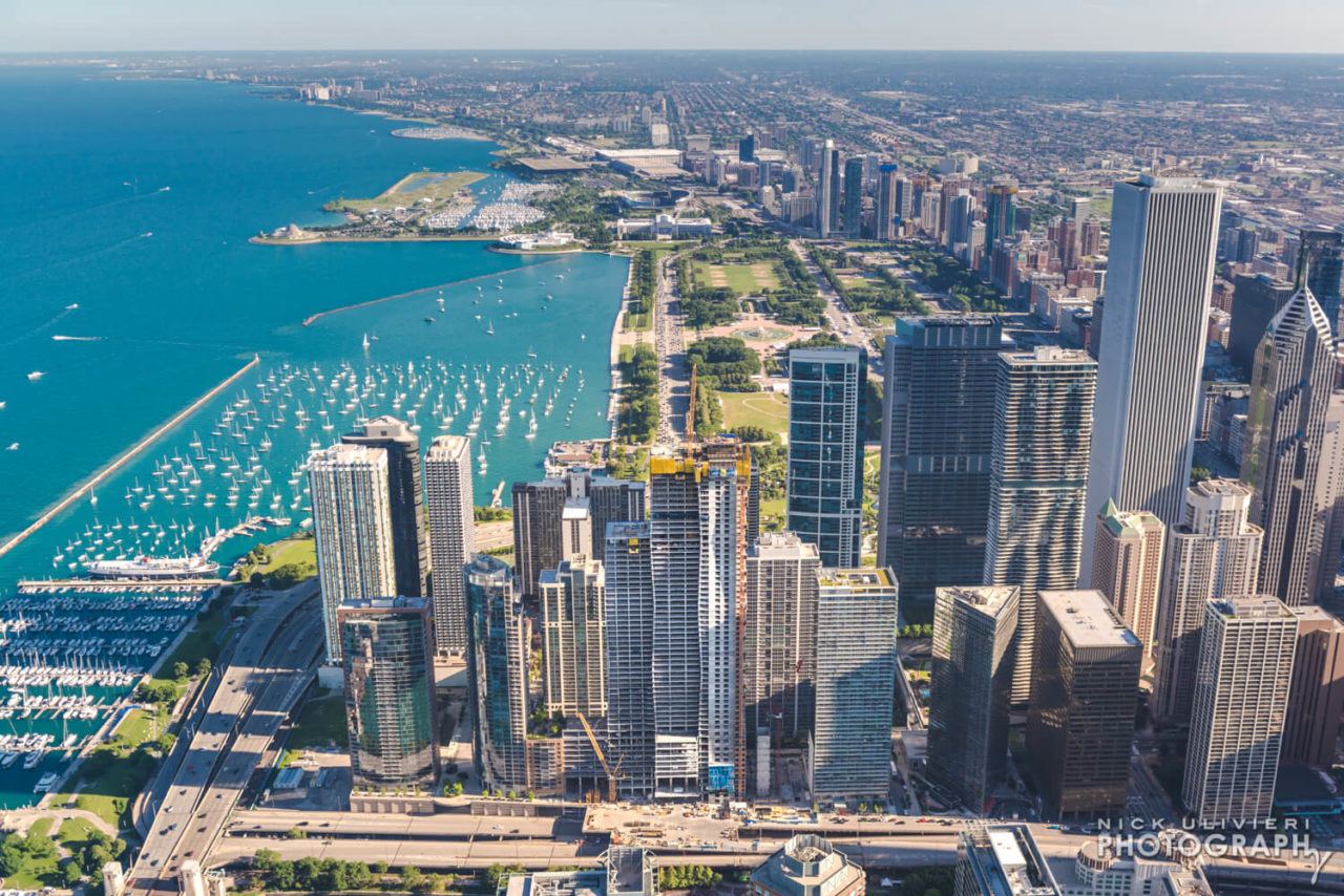 Summer afternoon aerials focused on Lakeshore East  Vista