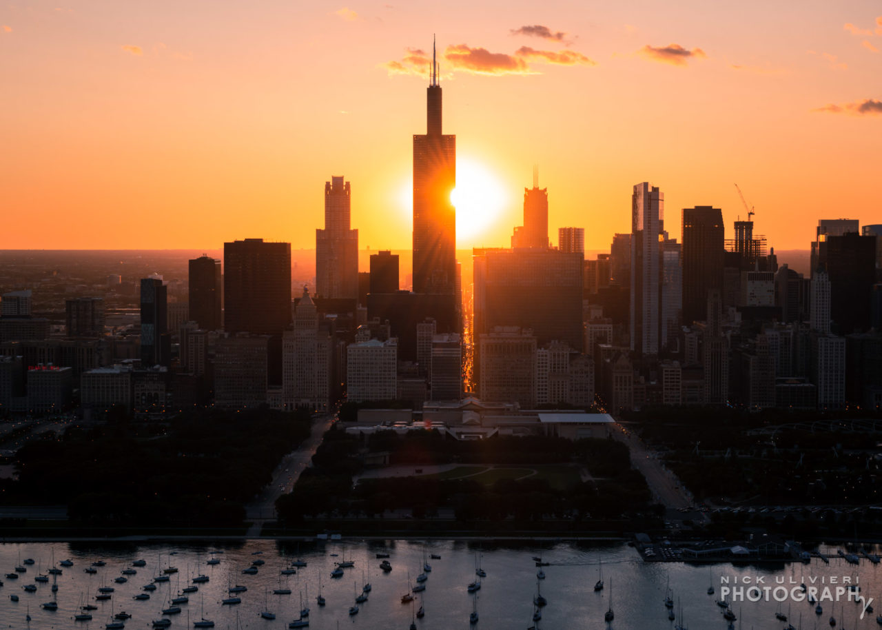 Sunset behind the skyline on the fall equinox