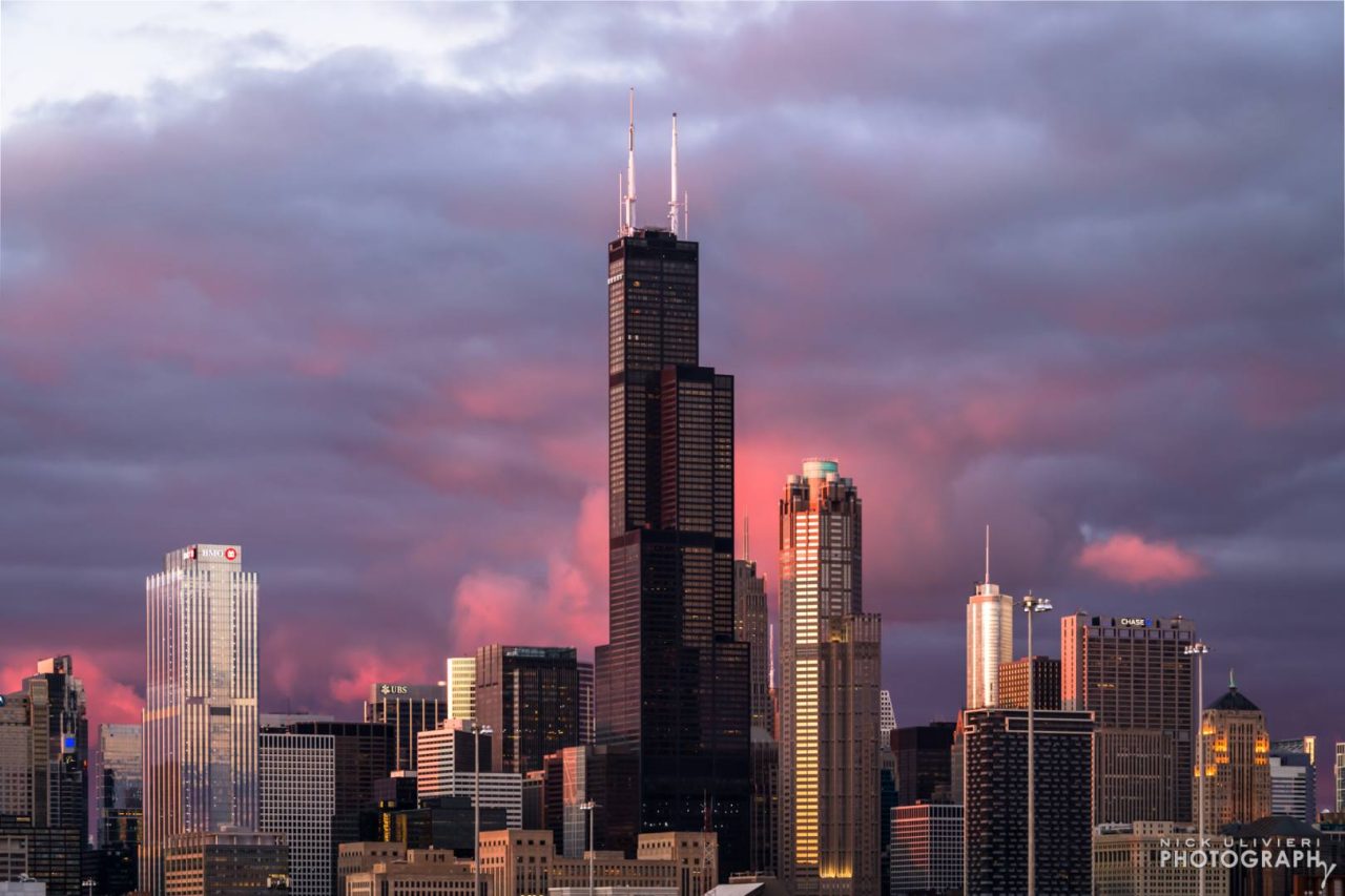 A cotton candy sunset behind the skyline