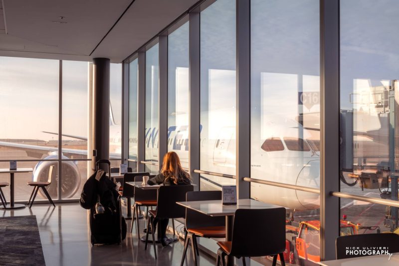 A flight attendant enjoys a quite moment before her next flight