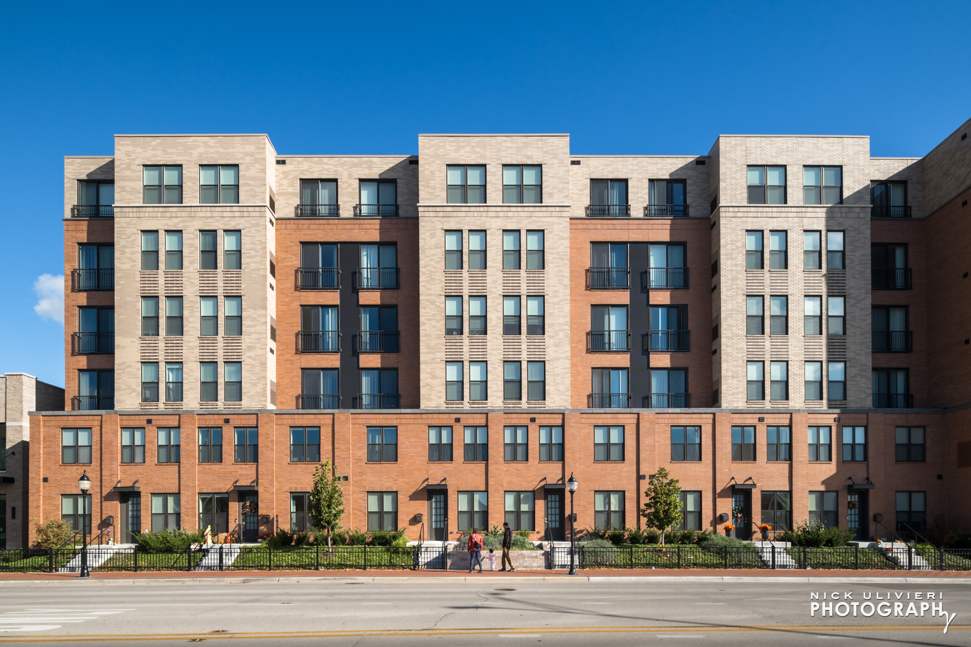 HQ Residences multifamily development in Mount Prospect Illinois designed by OKW Architects showing brick facade