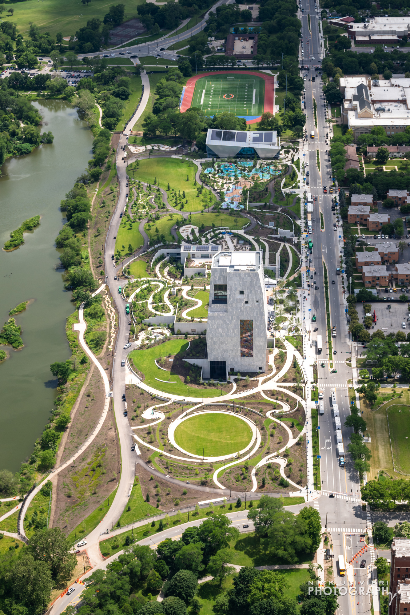 An aerial view of the entire campus. The Museum tower is in the center with portions of the park in the foreground and background.