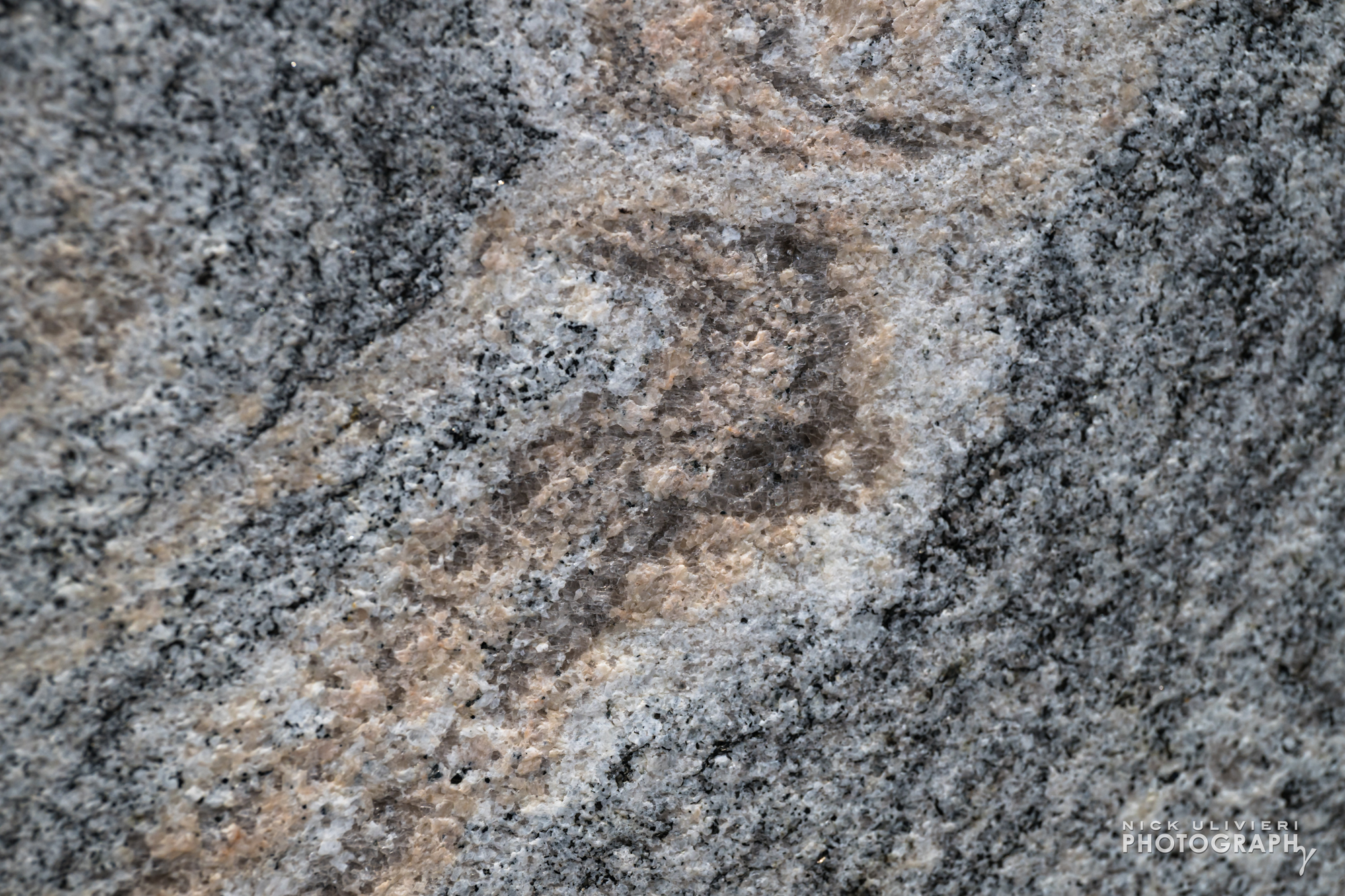 Intricate swirls and color gradations are visible in the New Hampshire granite that clads the Museum tower